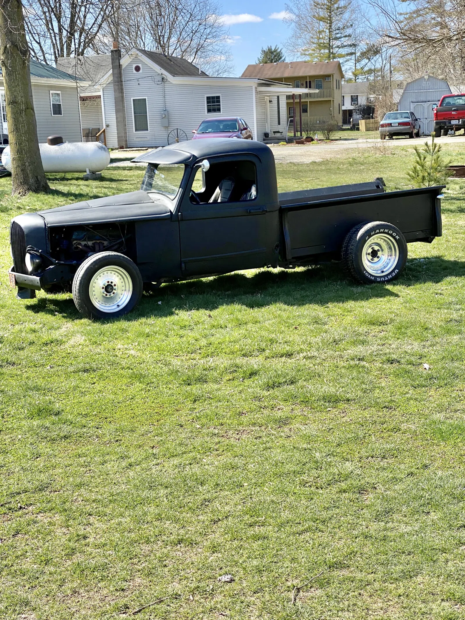 1930s Chevrolet pickup truck on Tyner Street, Metamora, Indiana. NOTE: the file's Commons description text appears to describe a different subject (an 1860 Carpenter Gothic house) and looks like an uploader metadata error; subject here is identified from the file title.