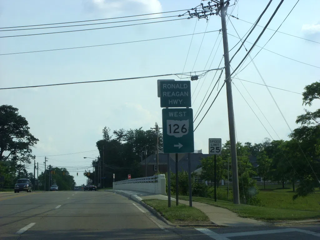 Montgomery Road southbound at the eastern terminus of Ronald Reagan Cross County Highway in Montgomery, Ohio, United States.