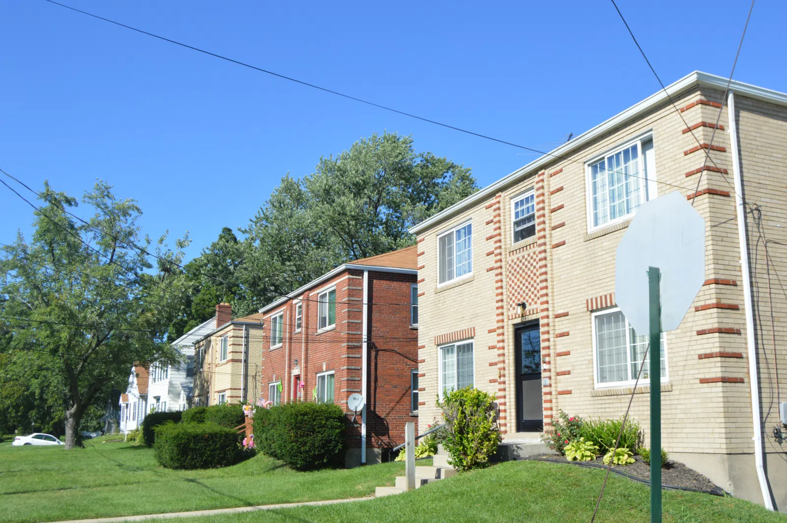 Houses on the eastern side of Silverton Avenue just north of Home Street in Silverton, Ohio, United States. Built shortly after the Second World War, this block's architecture is typical of the area's immediate postwar r
