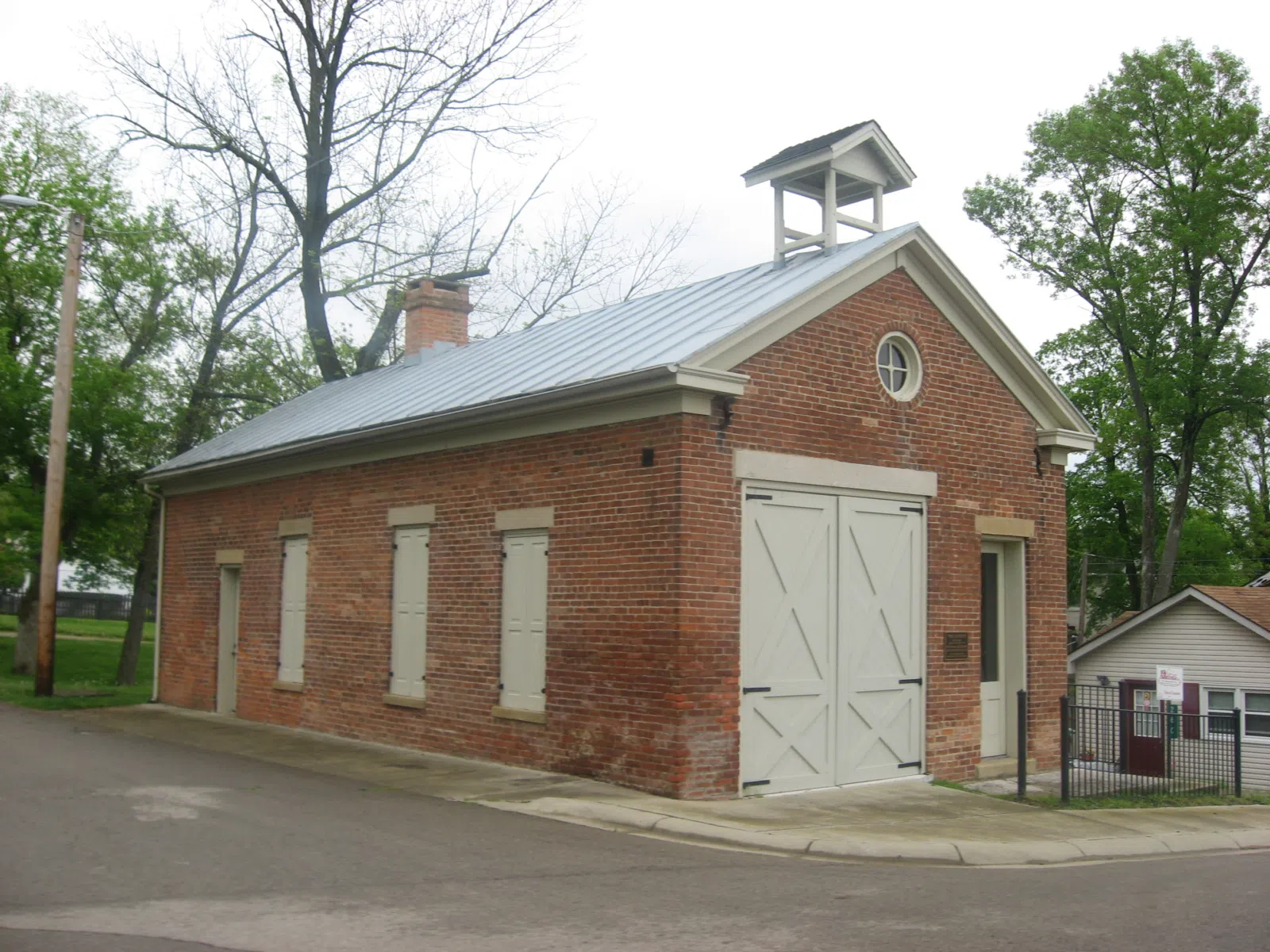 Front and western side of the Waynesville Engine House and Lockup, located at 260 Chapman Street in Waynesville, Ohio, United States. Built in 1881, it is listed on the National Register of Historic Places.