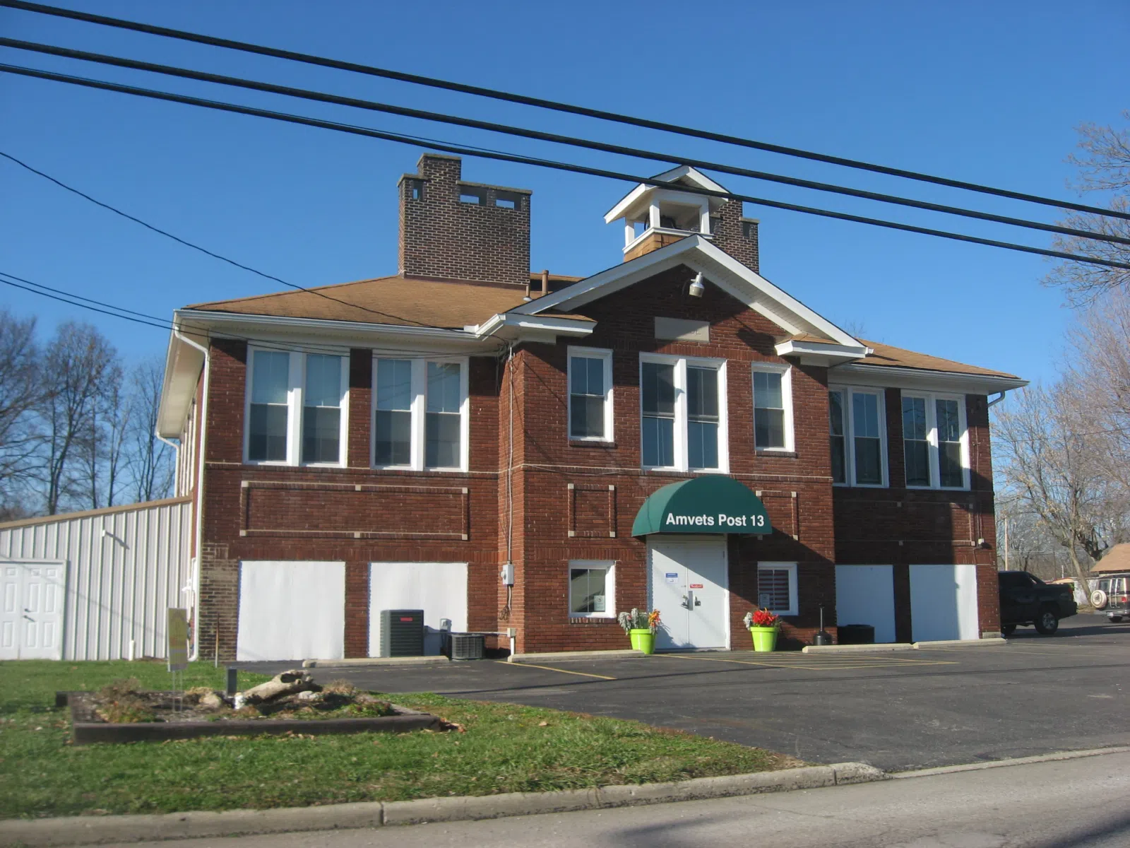 Front of the former West Harrison School (now an Amvets post), located at 507 S. State Street in West Harrison, Indiana, United States. Built in 1925, it is part of the locally-designated West Harrison Historic District.