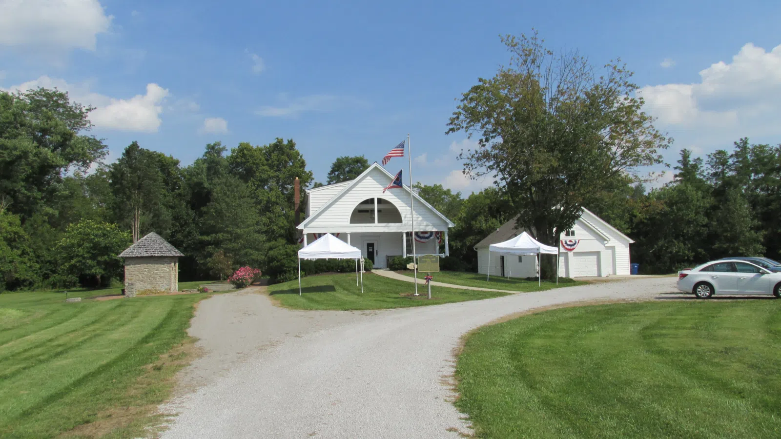 The Harmony Hill Museum in Clermont County, Ohio. The leftmost building is the Harmony Hill Dairy House, a milkhouse dating from 1800; it is Clermont County's oldest building, and it is listed on the National Register o