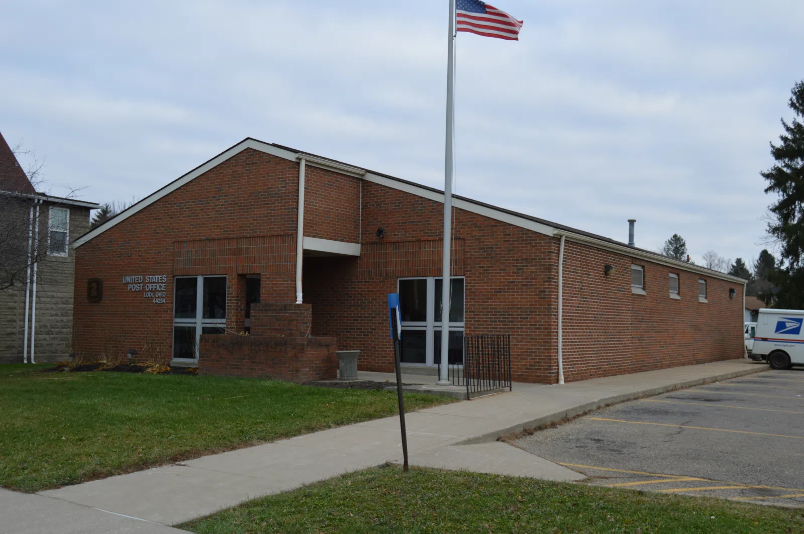 Front of the Lodi Post Office, located at 149 S. Harris Street in Lodi , Ohio , United States .