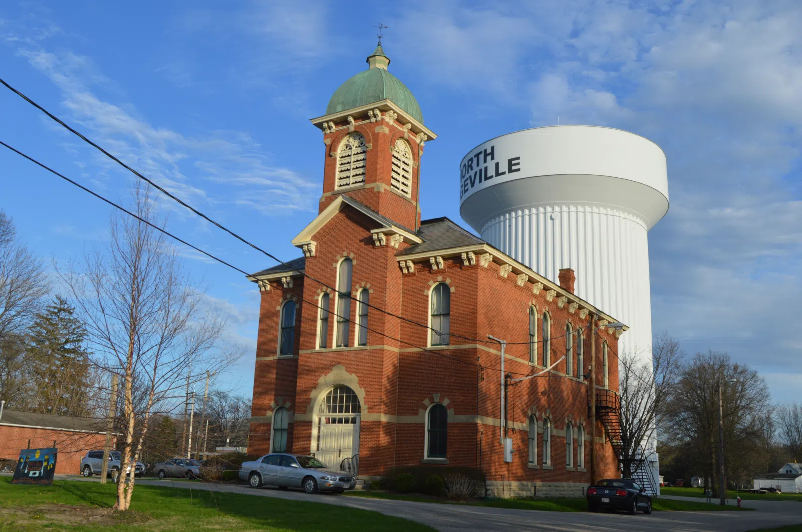 Front and western side of the North Ridgeville City Hall , located at 36119 Center Ridge Road ( U.S. Route 20 ) in North Ridgeville , Ohio , United States . Built in…
