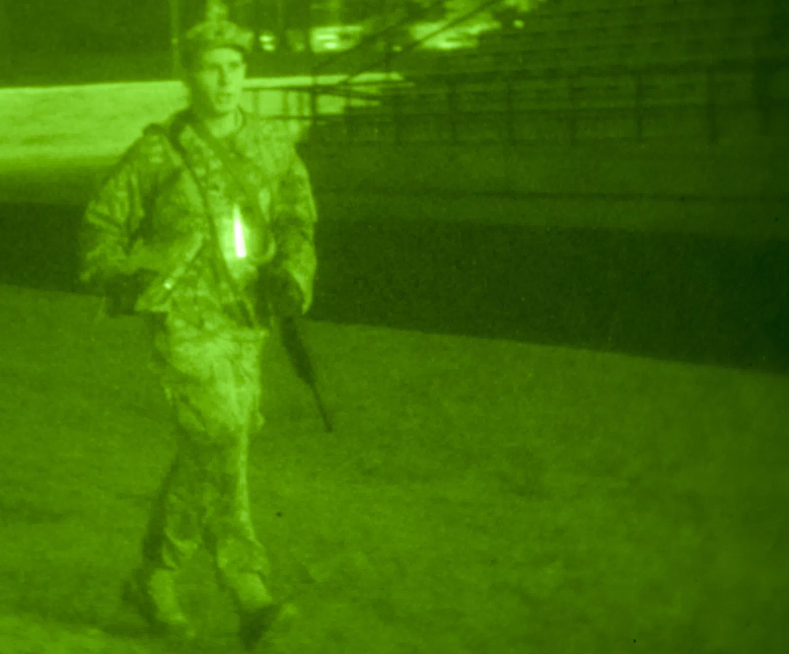 Army Reserve Sgt. David Rider runs to the finish line during the night Urban Warfighter Orienteering Course event at the 2010 Department of the Army Best Warrior…