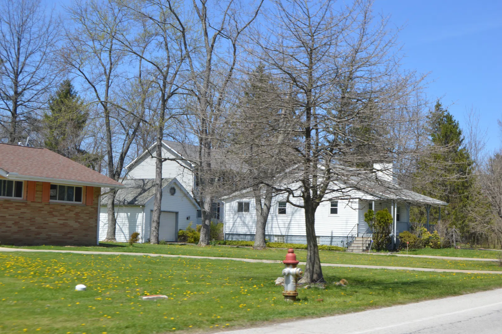 Houses on the western side of Brainard Road in southern Woodmere , Ohio , United States .