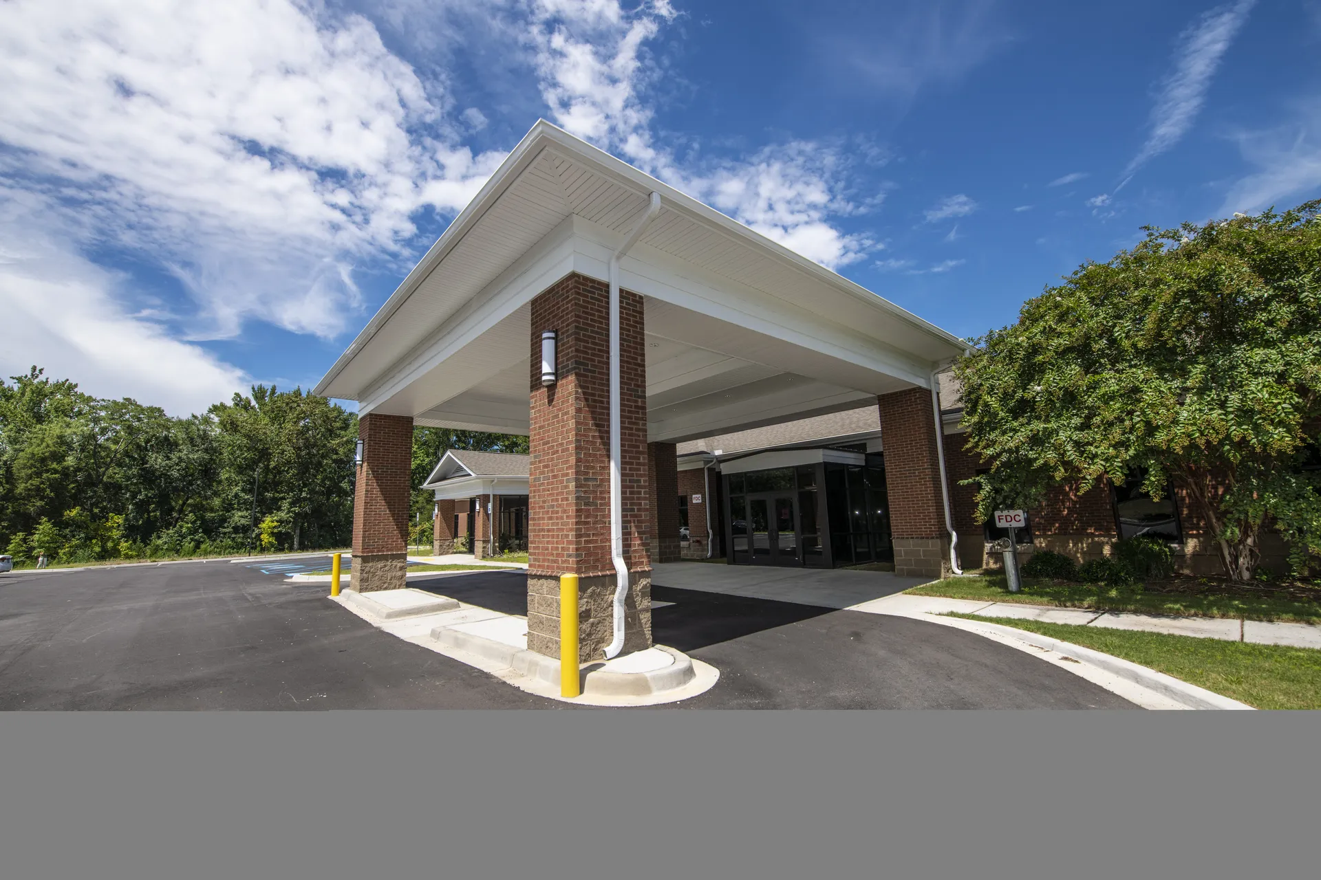 Main drive-through patient drop-off entrance of the Sandhills Medical Foundation facility, where a U.S. Department of Agriculture USDA Rural Development RD Community Facilities Direct Loans and Guaranteed Loans Program provided $2,964,500.00 for the 12,150-square-foot expansion i