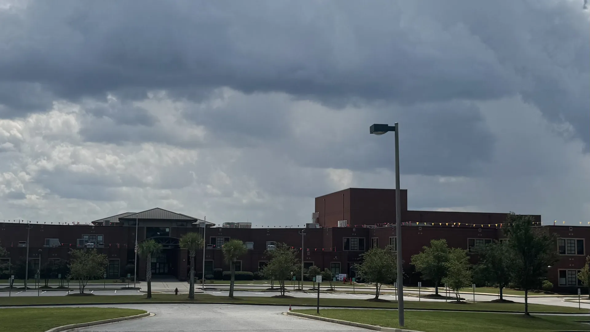 Image of the front entrance of White Knoll High School