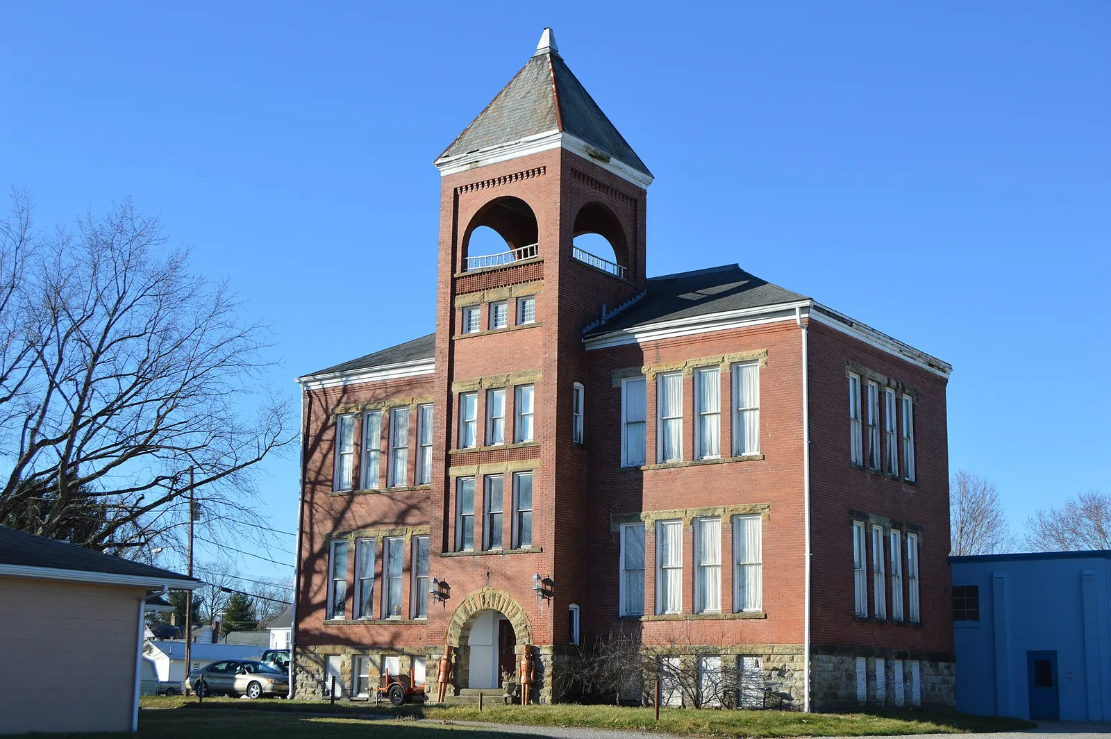Front and northern side of the old Bremen school, located along Broad Street (State Route 664) at 164 Walnut Street in Bremen, Ohio, United States.