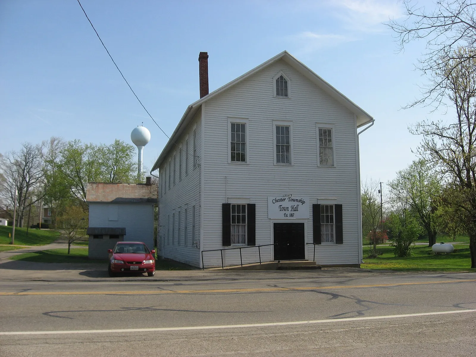 Front of the Chester Town Hall, located on the northeastern corner of the intersection of Sandusky (State Route 95) and Short Streets in Chesterville, Ohio, Uni