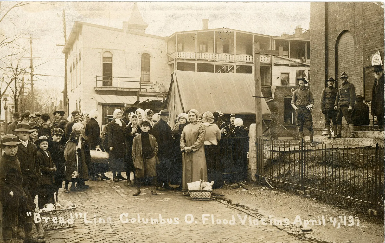 Photograph of a bread line for 1913 flood victims.