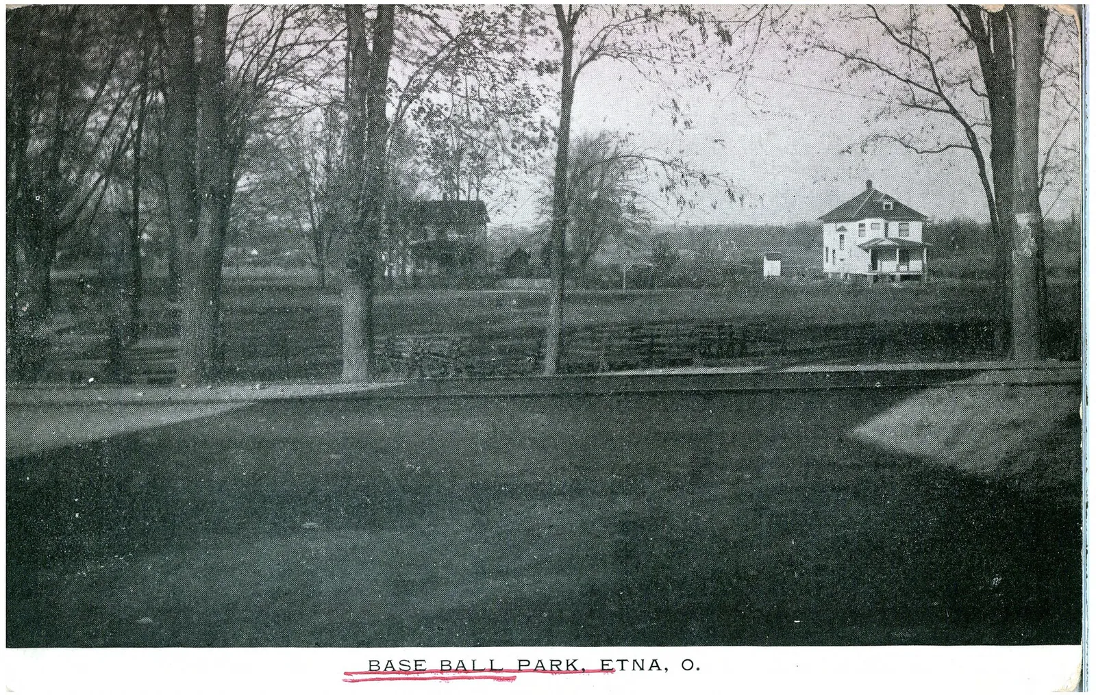 A black and white photograph of homes in Etna.