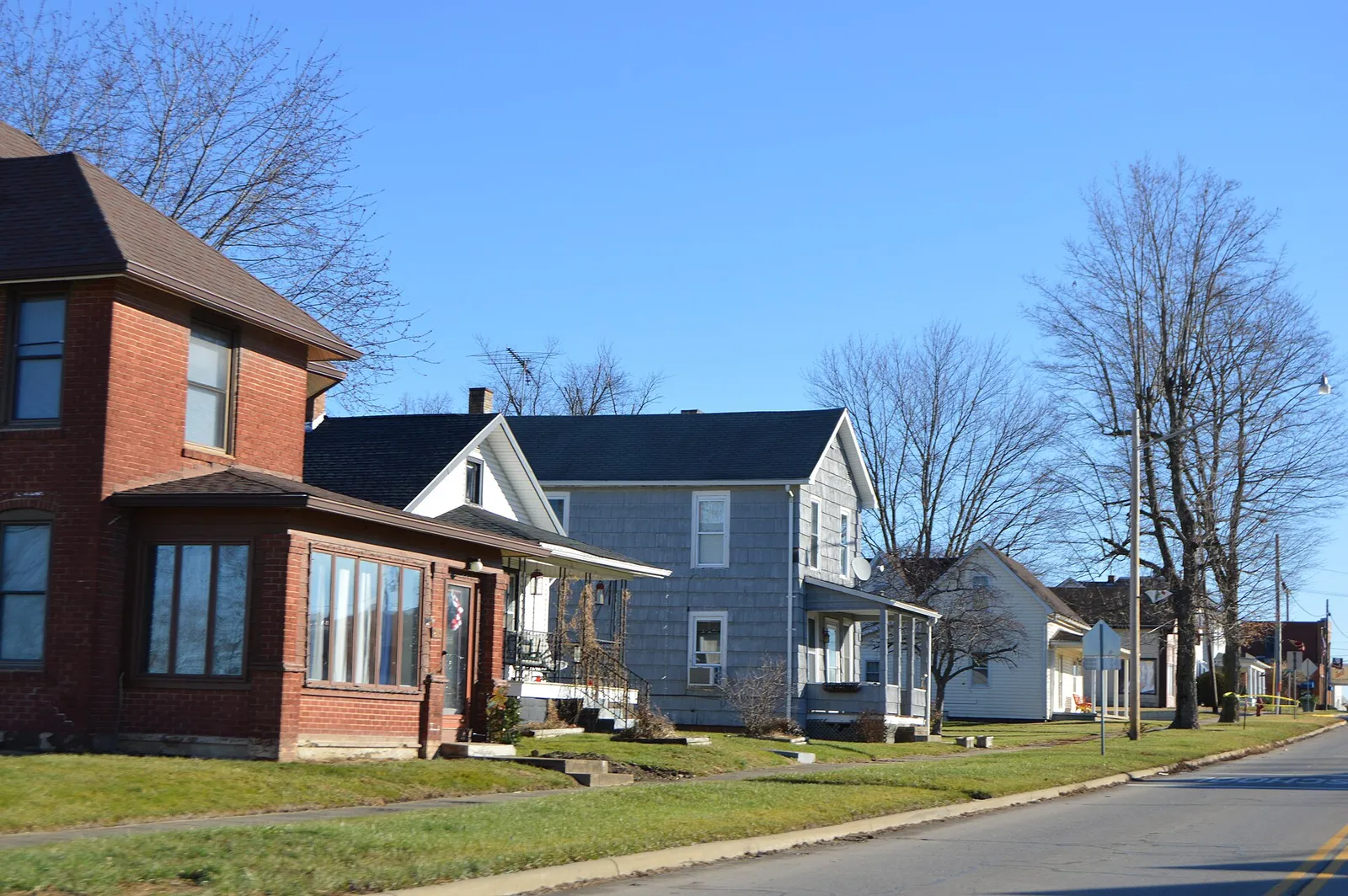 Houses on the northern side of Main Street (State Route 37) east of Court Street in Junction City, Ohio, United States.
