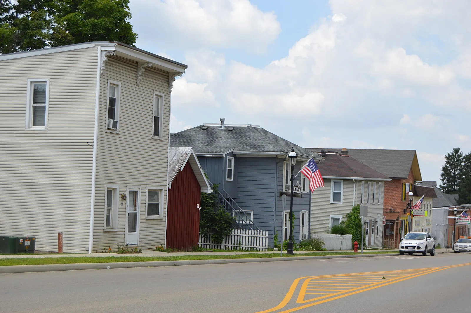 Buildings on the southwestern side of Columbus Street, seen looking northwest from the Walnut Street intersection, in Lithopolis, Ohio, United States.