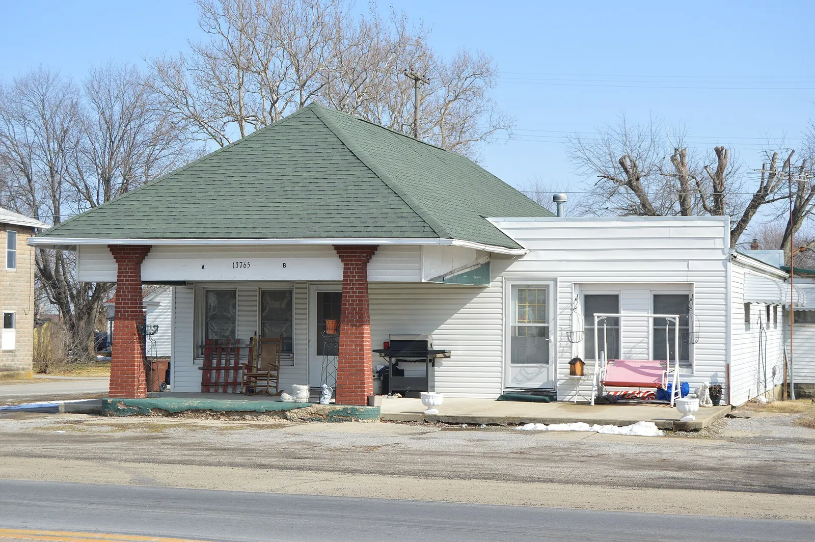 Front of the former gas station located on the southeastern corner of the junction of Main (State Route 38) and Federal (State Route 323) Streets in Midway, Ohi