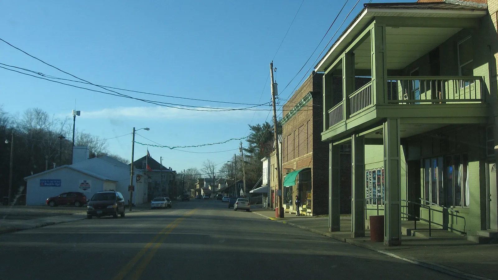 Buildings on the northern side of the 100 block of W. Main Street (State Route 93) in New Straitsville, Ohio, United States.