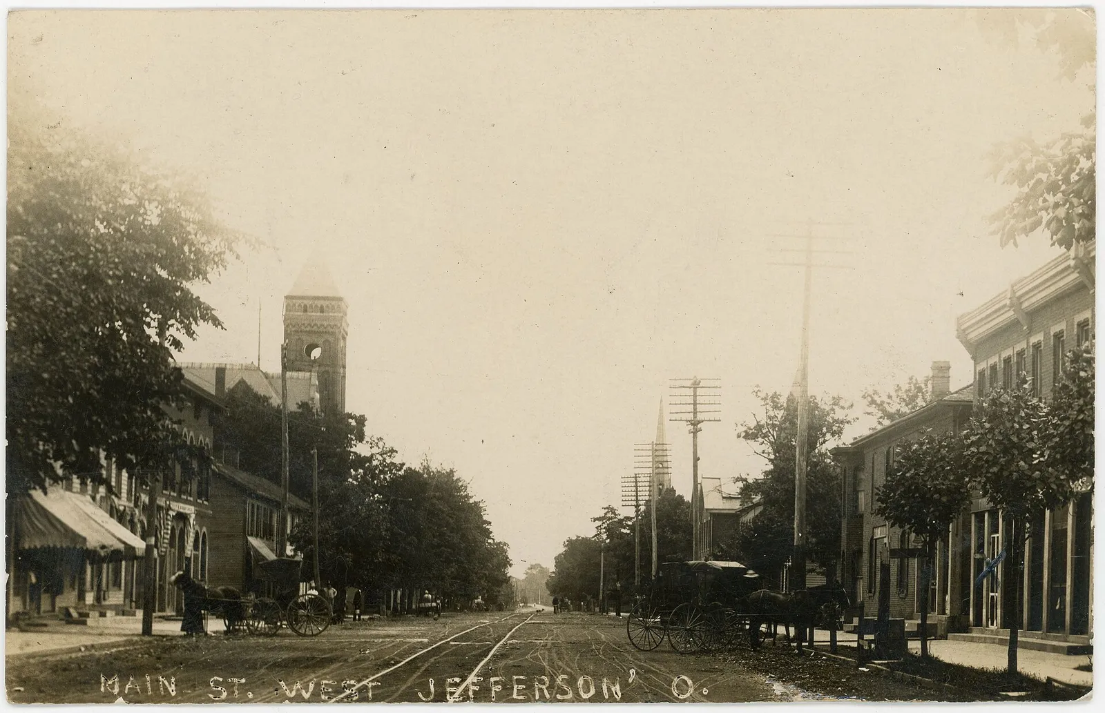 Black and white postcard of Main street in West Jefferson.