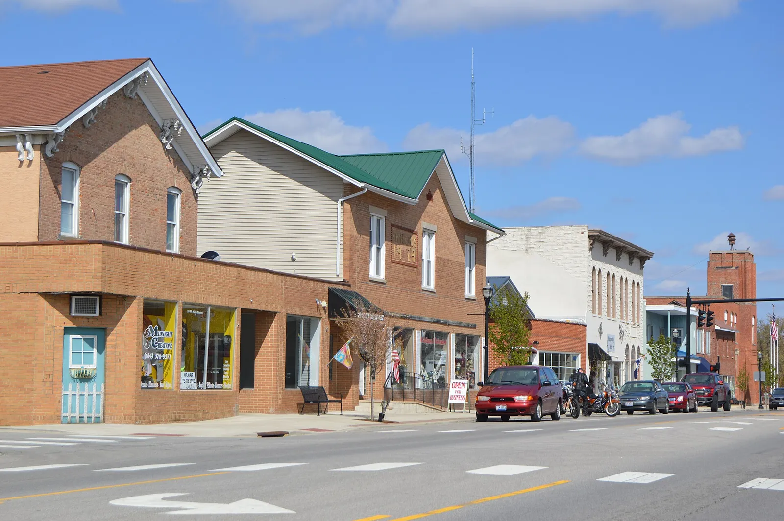 Buildings on the northern side of the first block of W. Main Street (U.S. Route 40) in West Jefferson, Ohio, United States.