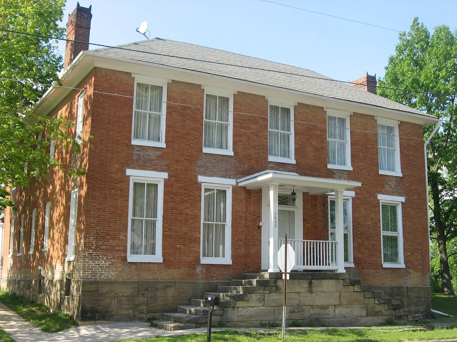 Front and western side of the Joseph Ijams House, located at 7660 Main Street in West Rushville, Ohio, United States.  Built in 1810, it is listed on the Nation
