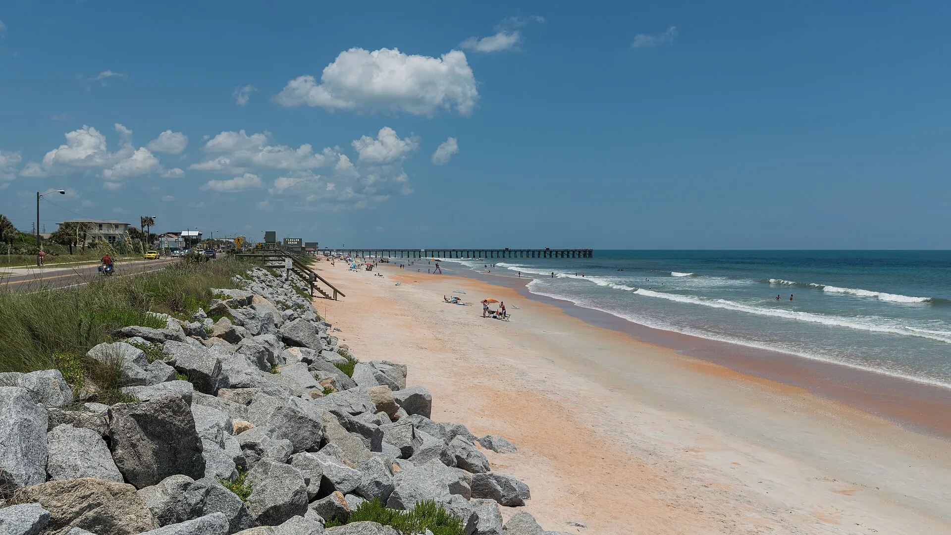 A south view of the beach and pier of Flagler Beach, Florida.