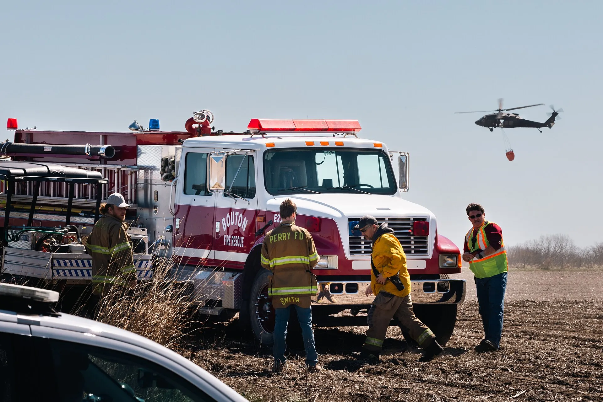 An Iowa National Guard UH-60 Black Hawk helicopter equipped with a Bambi bucket conducted a wildfire-control exercise alongside local emergency management agencies on April 12, 2024, in Bouton, Iowa.