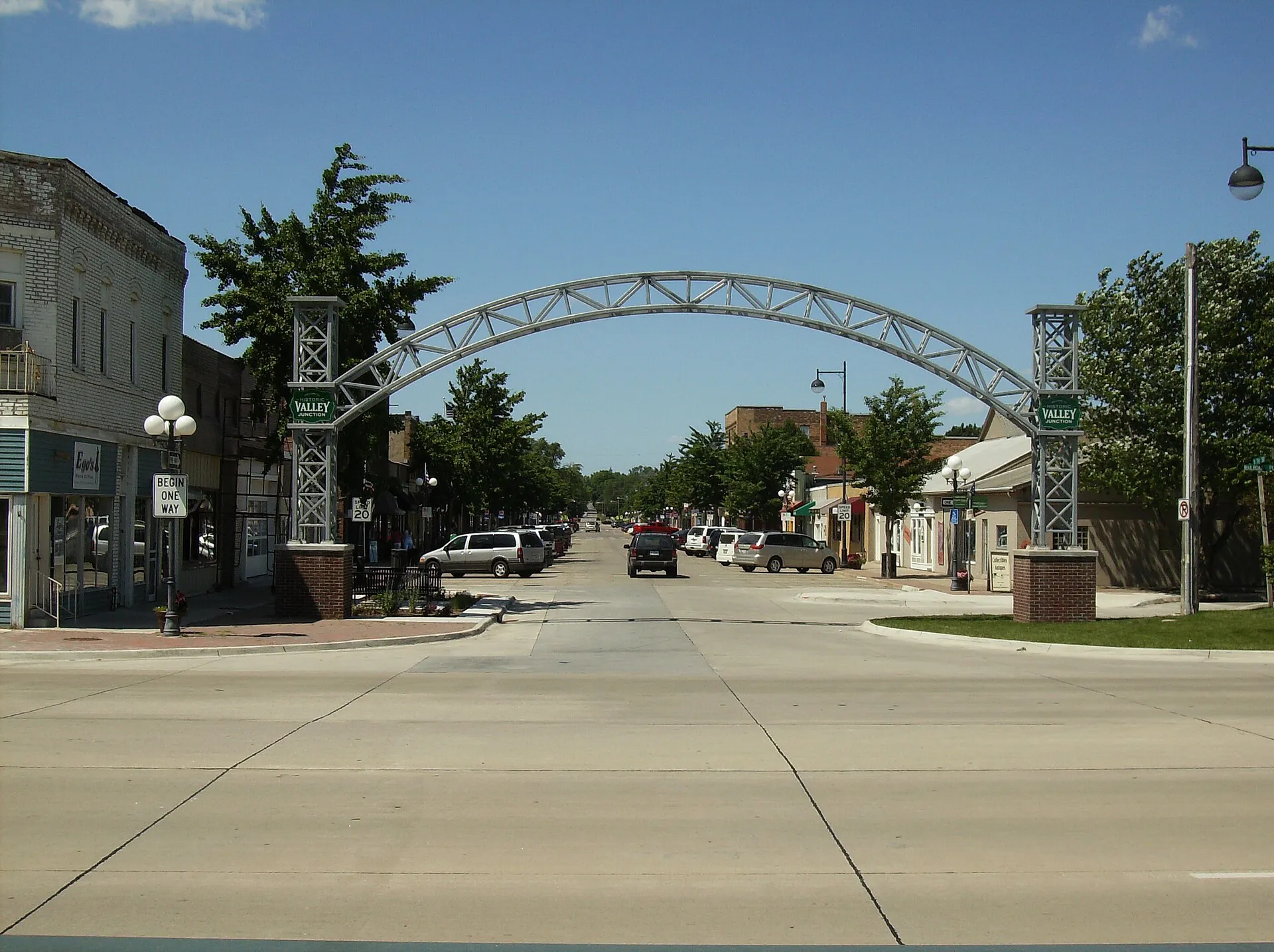 Historic Valley Junction in West Des Moines, Iowa — arch over the street with historic storefronts.