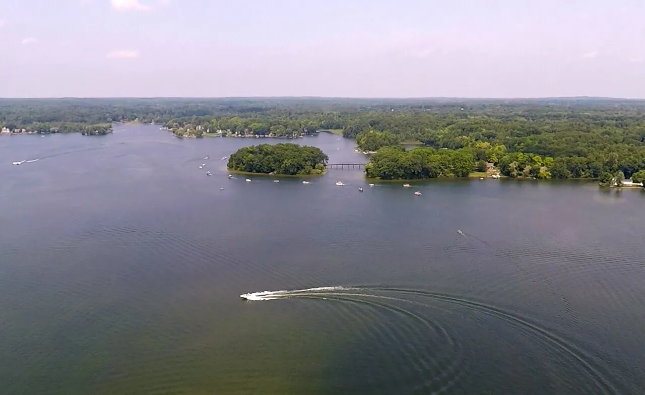 An aerial photo of Lakeville Lake in Addison Township, Michigan which was taken June 30, 2018
