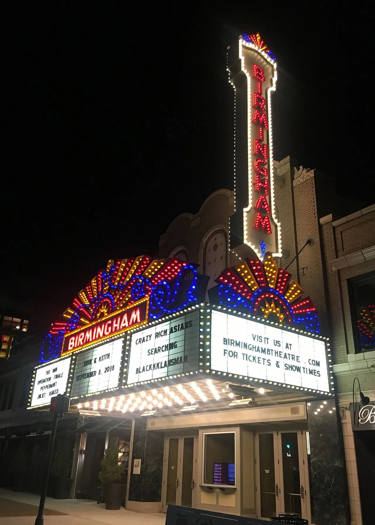 The Birmingham 8 Theatre at night.