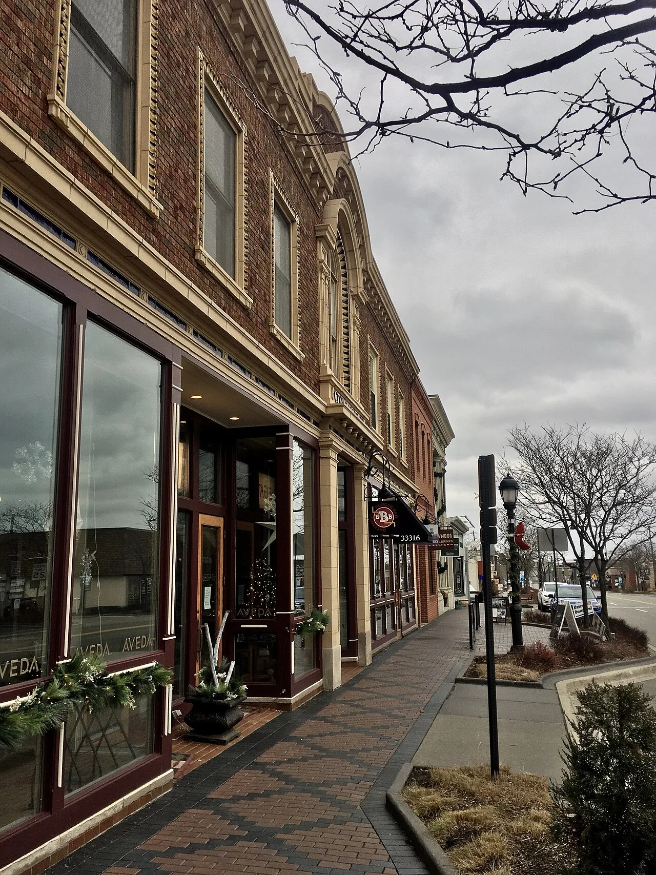 Looking southeast along Grand River Avenue from in front of the Civic Theater in the commercial heart of Farmington, Michigan, December 2020.