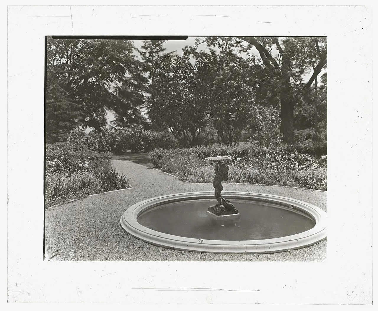 Title: "Lake Terrace," John Stoughton Newberry Jr. house, 99 Lake Shore Drive, Grosse Pointe Farms, Michigan. Ornamental pool and fountain Abstract/medium: 1 photograph : glass lantern slide, b&w ; 3.25 x 4 in.
