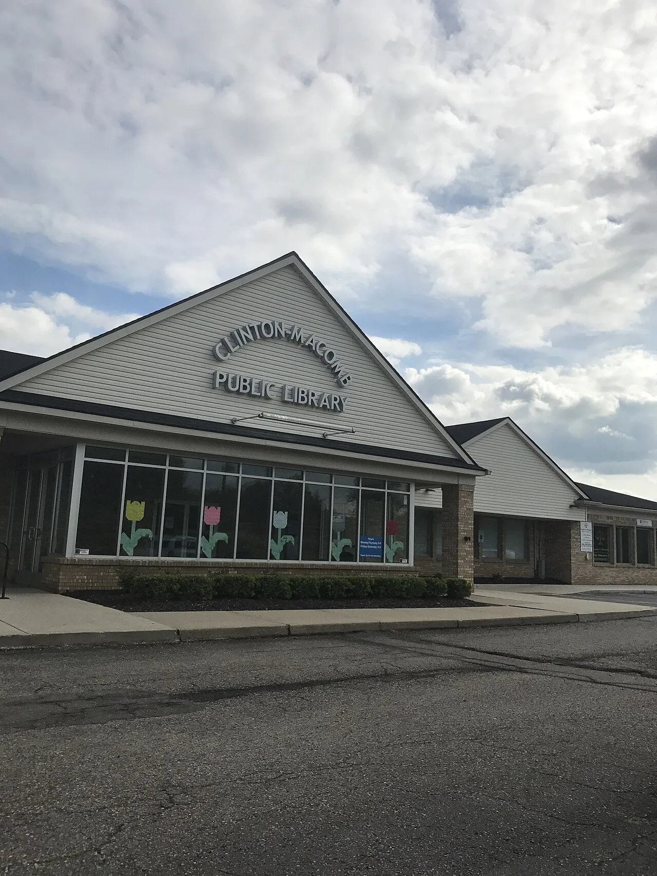 The former Clinton-Macomb Public Library's North Branch in Macomb Township, Michigan. As of 2024, the location is an office for a private robotics company.