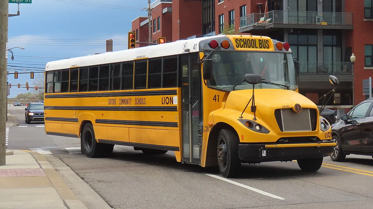 Oxford Community Schools bus 41, a 2020 Lion Electric LionC, seen in downtown Royal Oak, Michigan, following an appearance at Turn Oakland County Green's 2023 Earth Day event.
