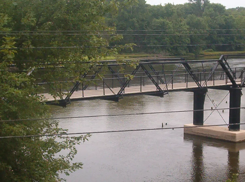 The New Richmond Swing Bridge over the Kalamazoo River in Manlius Township, Michigan, United States, is viewed here from an adjacent railroad bridge. The bridge is listed on the US National Register of Historic Places (N