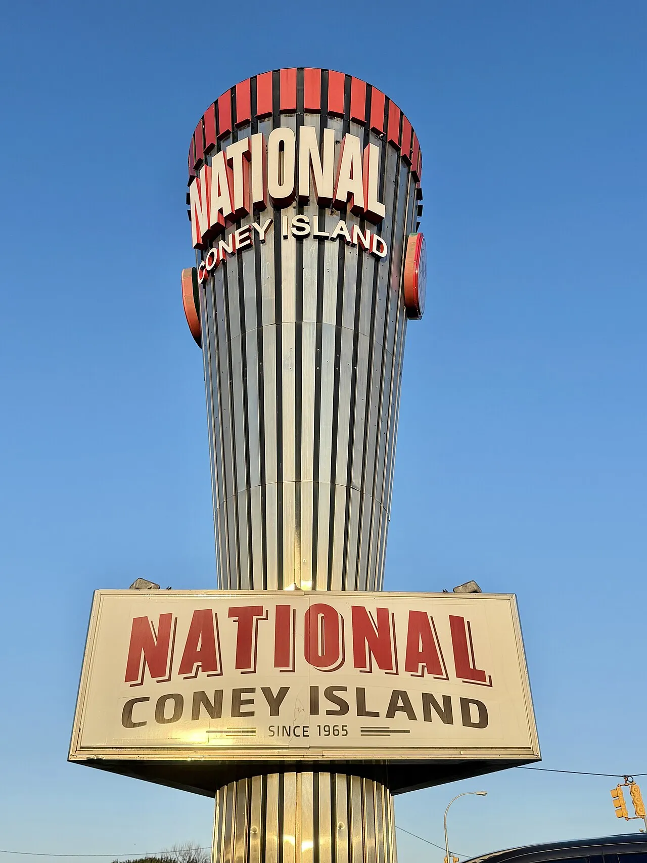 A rotating conical sign at the National Coney Island restaurant at 11 Mile Road and Gratiot Avenue in Roseville, Michigan, photographed September 16, 2026.