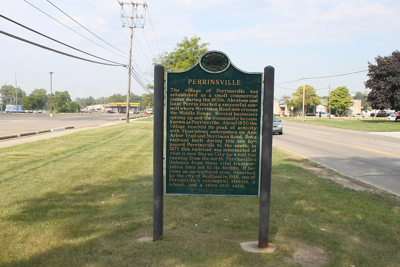 Perrinsville Village Michigan historical marker, east of Ann Arbor Trail and Merriman Road intersection on south side of Ann Arbor Trail. The site is a Registered Michigan Historic Site.