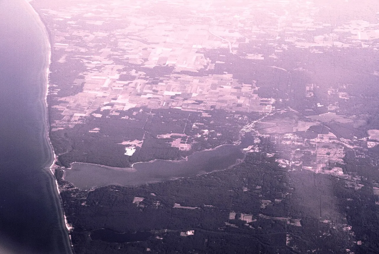 Aerial view from the south towards north, over Muskegon county, Michigan. The lake visible is the White Lake.