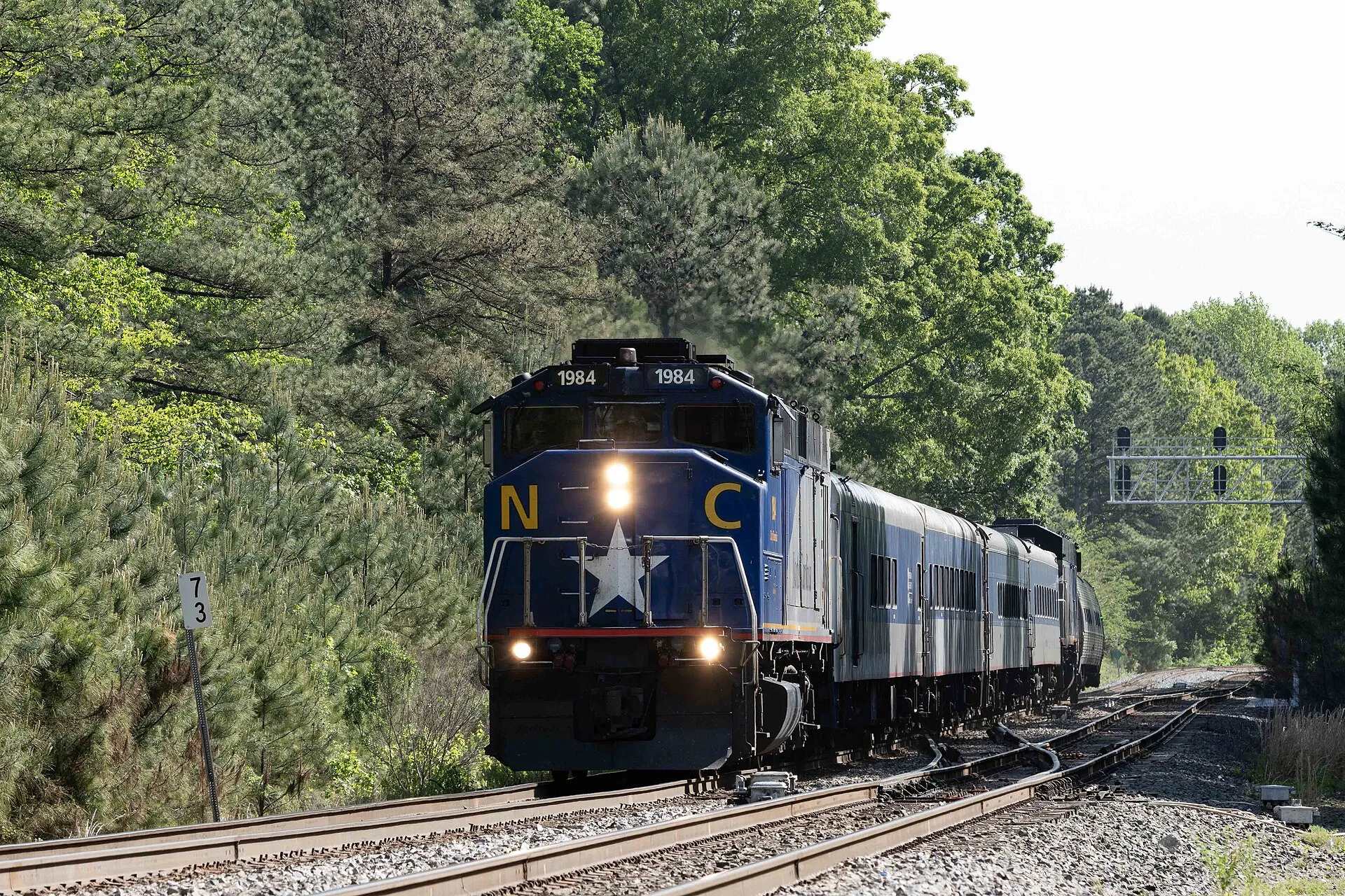 An F59PH locomotive leads Amtrak's Piedmont train in Cary, North Carolina.