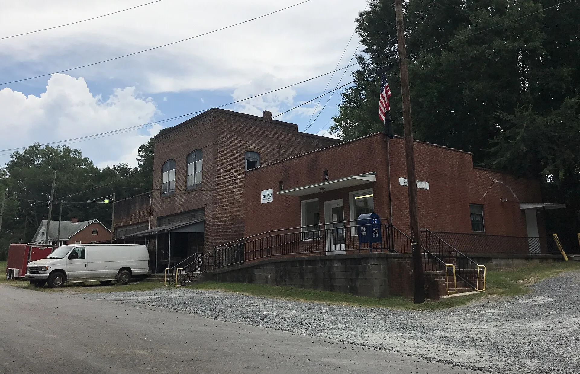 Cluster of old buildings in Moncure, post office on the right.