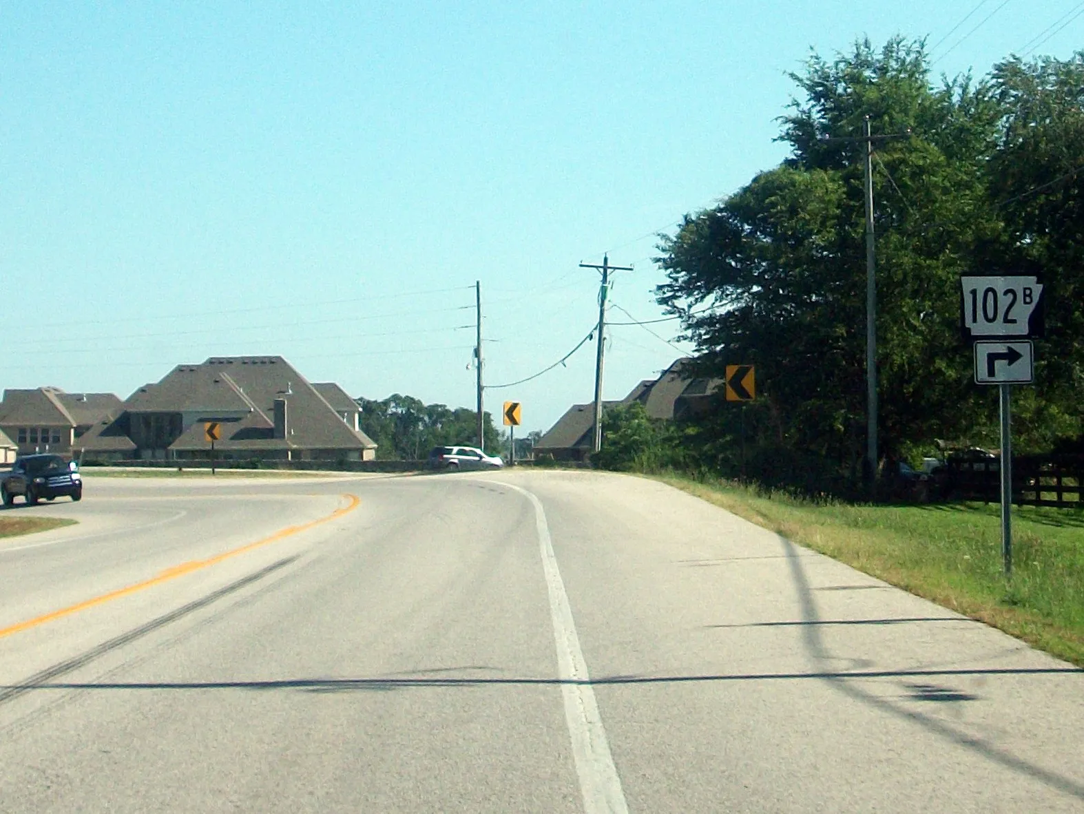 Sign showing junction with the northern terminus of Highway 102B at Highway 72 in Centerton, Arkansas