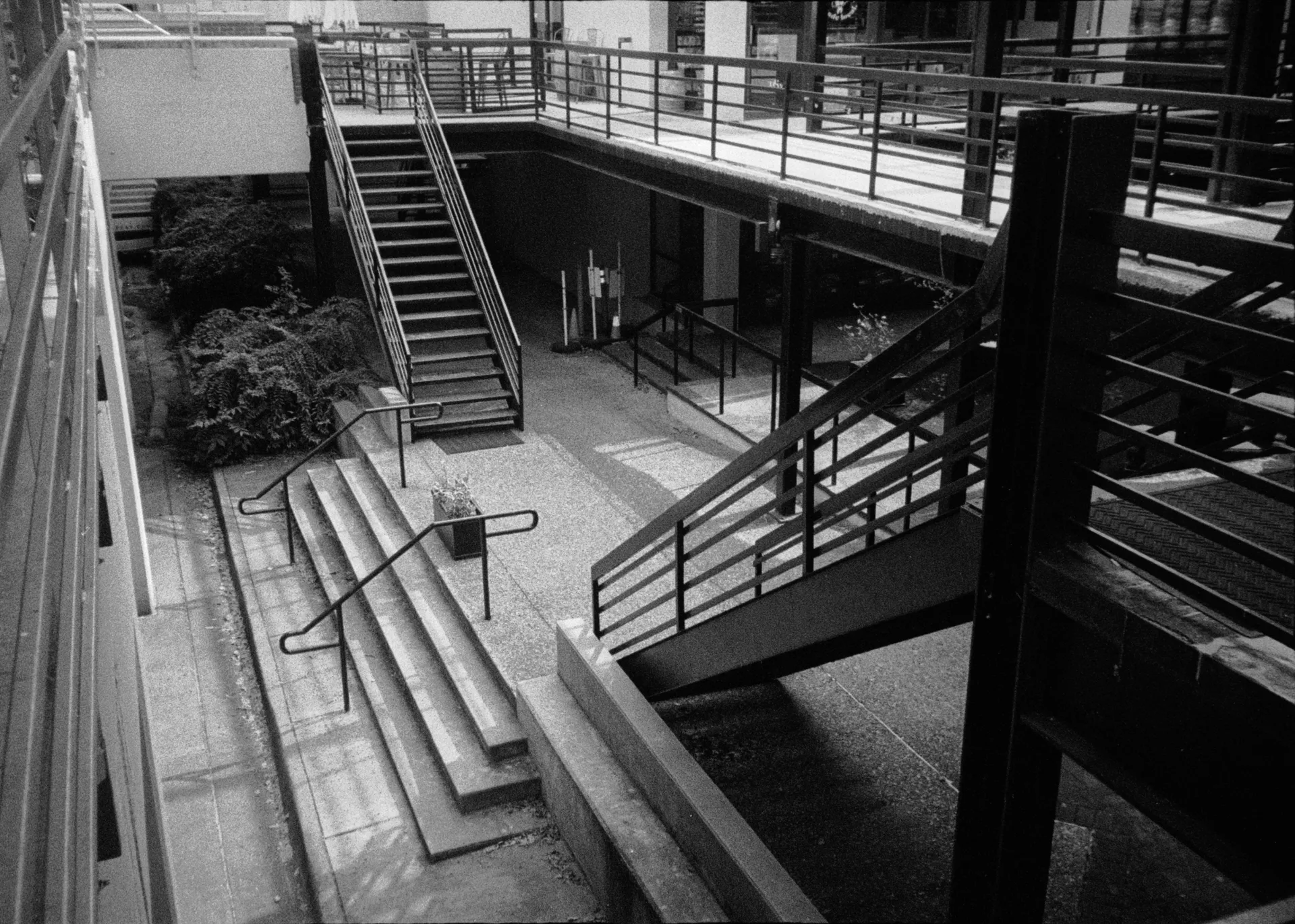 Stairs to parking and service area just off the square in Fayetteville, AR, August 3, 2025.