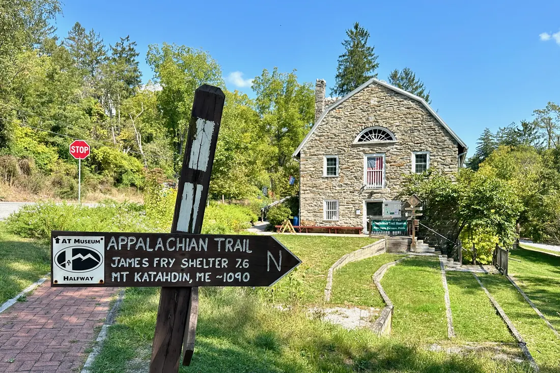 The Appalachian Trail passing the Appalachian Trail Museum (former grist mill of the Pine Grove Iron Works).