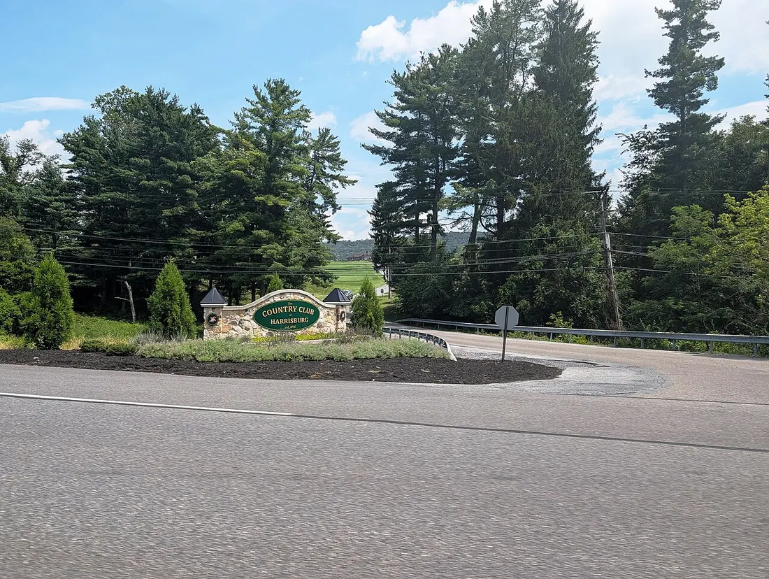 Photo of the entrance to Country Club of Harrisburg in Middle Paxton Township, Pennsylvania. Photo taken from Pennsylvania Route 443 (Fishing Creek Valley Road) looking east-southeast.
