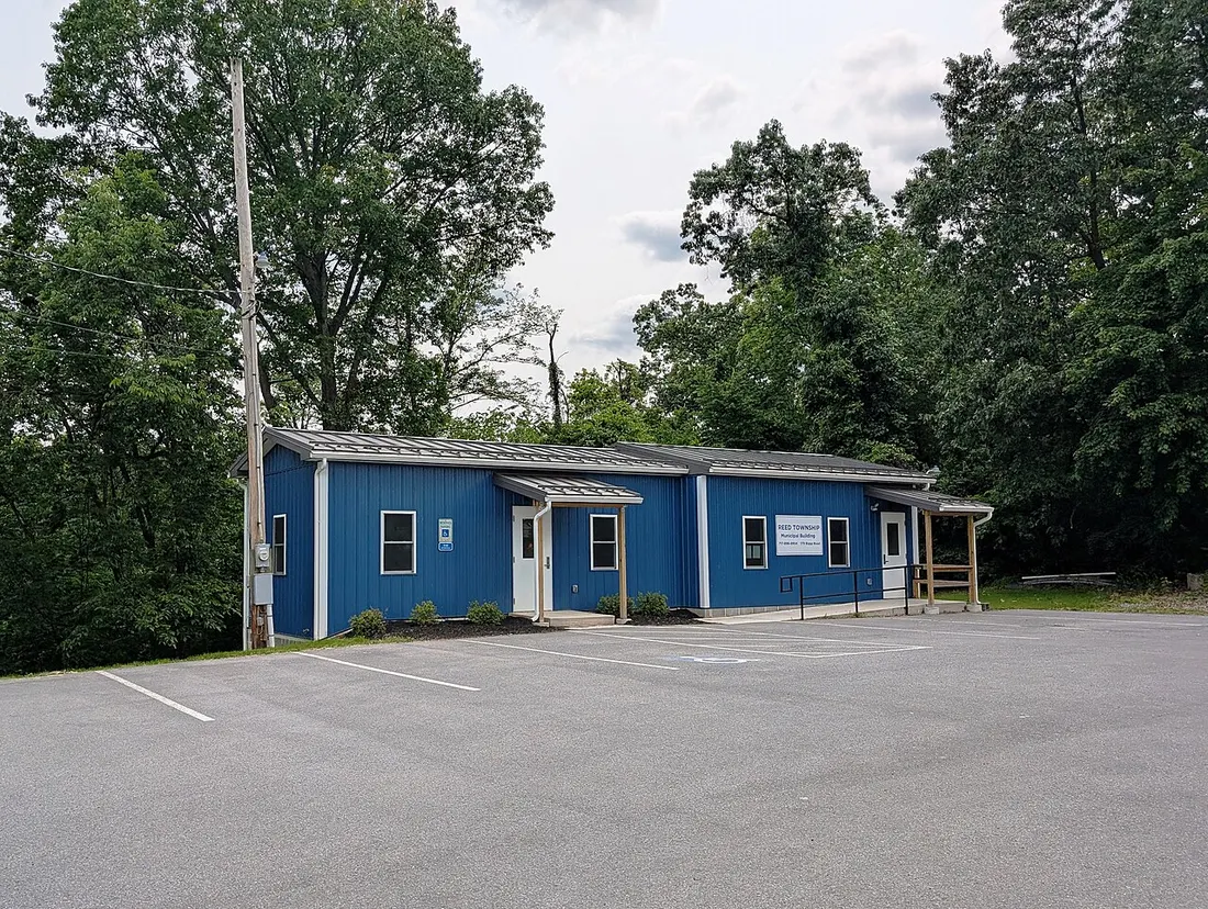 Photo of the Reed Township, Pennsylvania Municipal Building. Photo taken from the building's parking lot looking southwest.