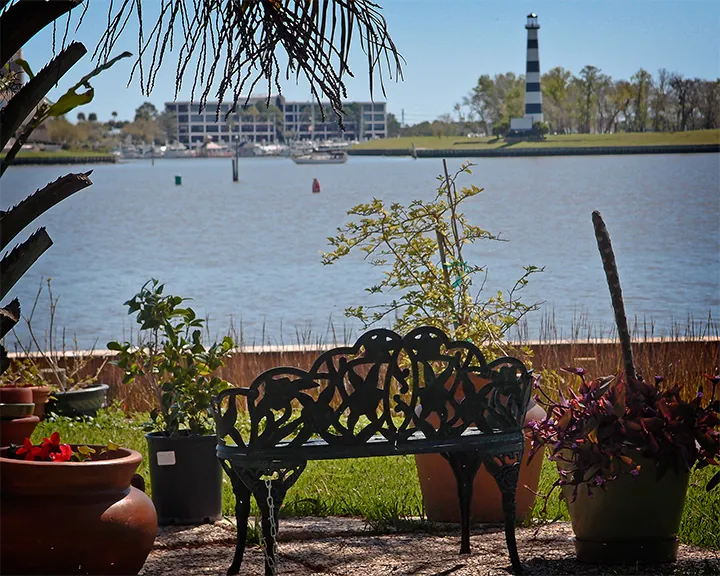Waterfront bench by Clear Lake with South Shore Harbor Marina across the water