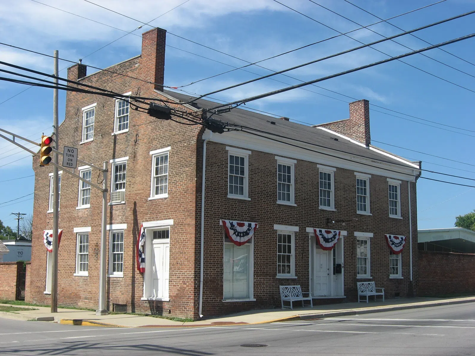 Front and eastern end of the George Makepeace House, located at 5 W. Main Street (State Road 32) in Chesterfield, Indiana, United States. Built in…