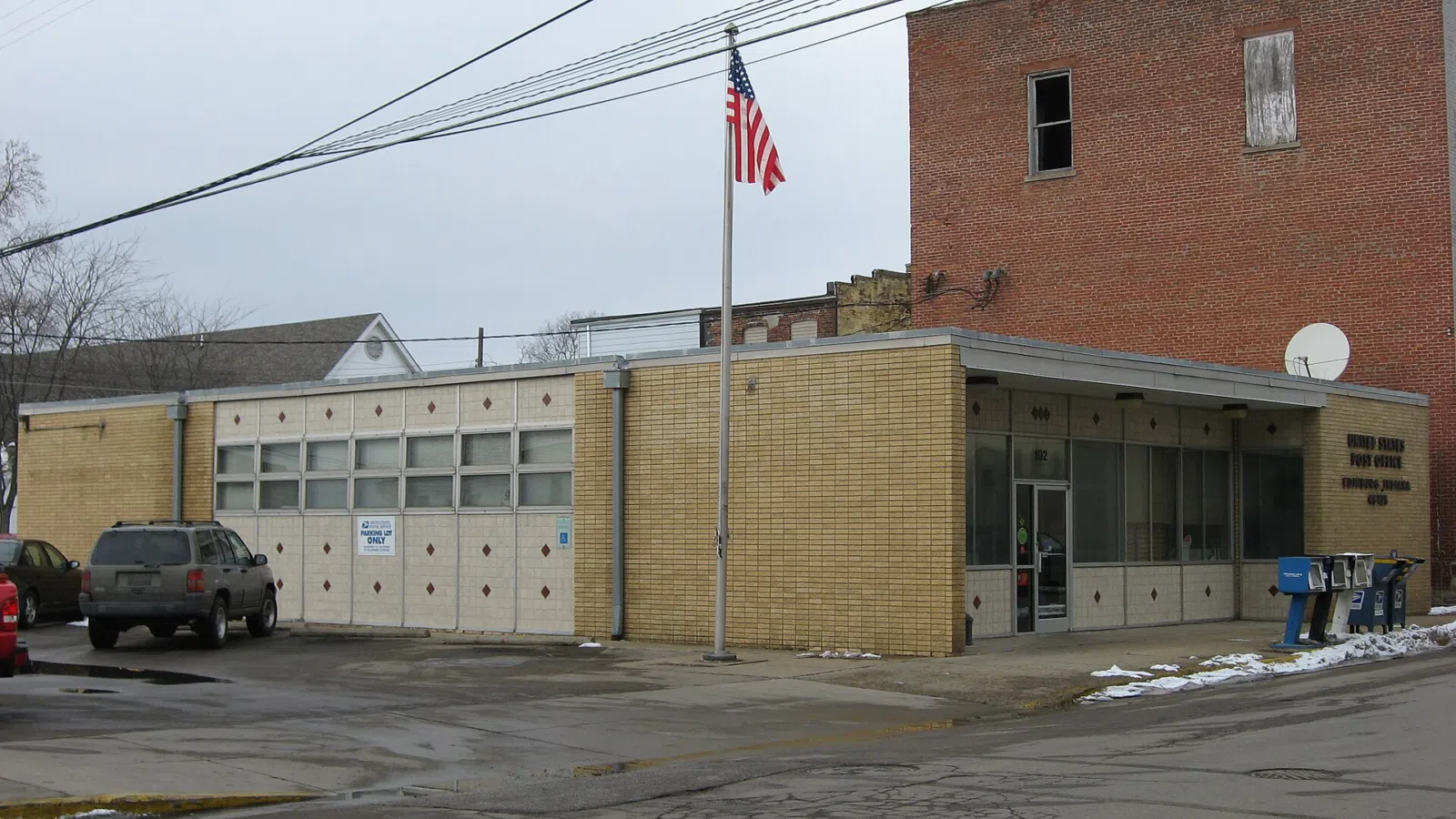 Front of the Edinburgh Post Office, located at 102 S. Walnut Street in Edinburgh, Indiana, United States.