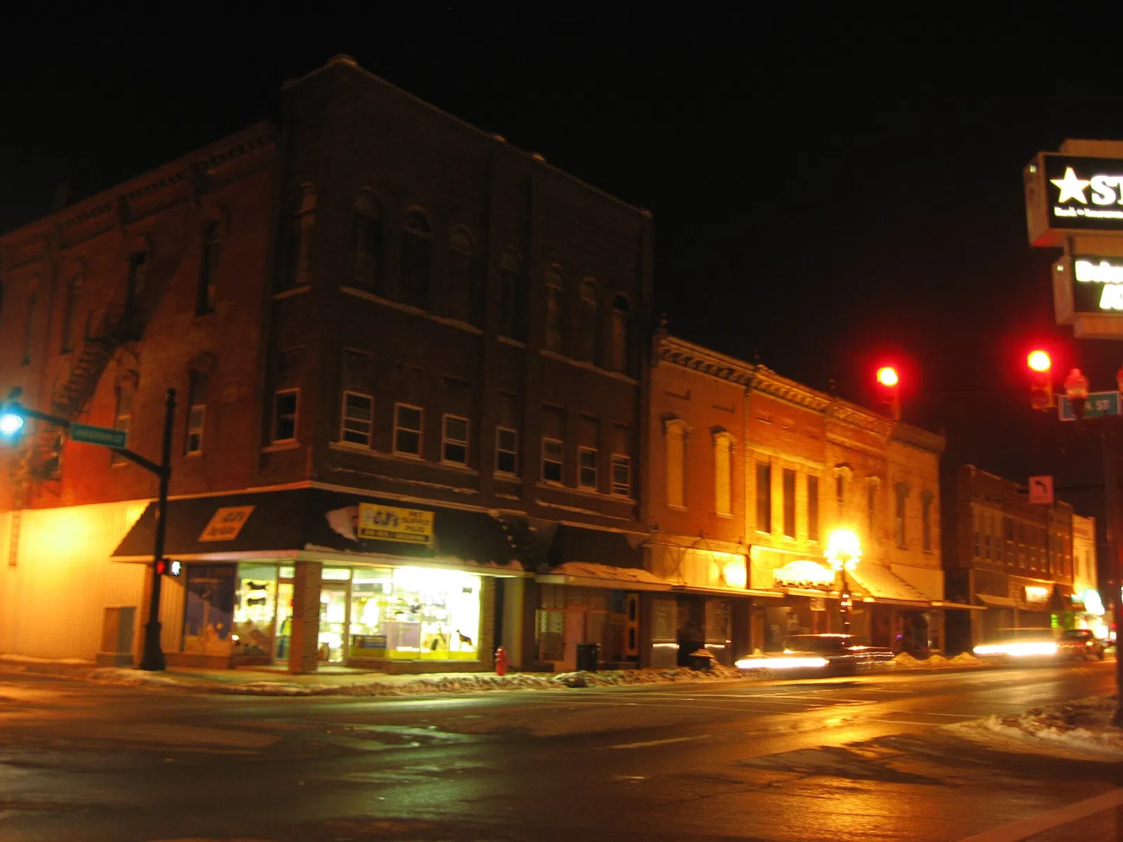 Buildings on the northwestern corner of the intersection of Anderson (State Road 13) and A Streets in central Elwood, Indiana, United States. These…