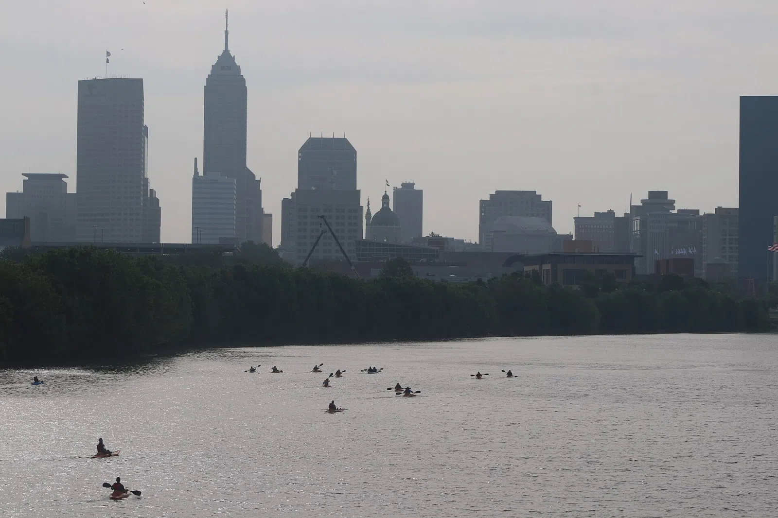 Nearby Indianapolis landmark: The photo depicts people kayaking on the White River near downtown Indianapolis, Indiana, USA in June 2019.