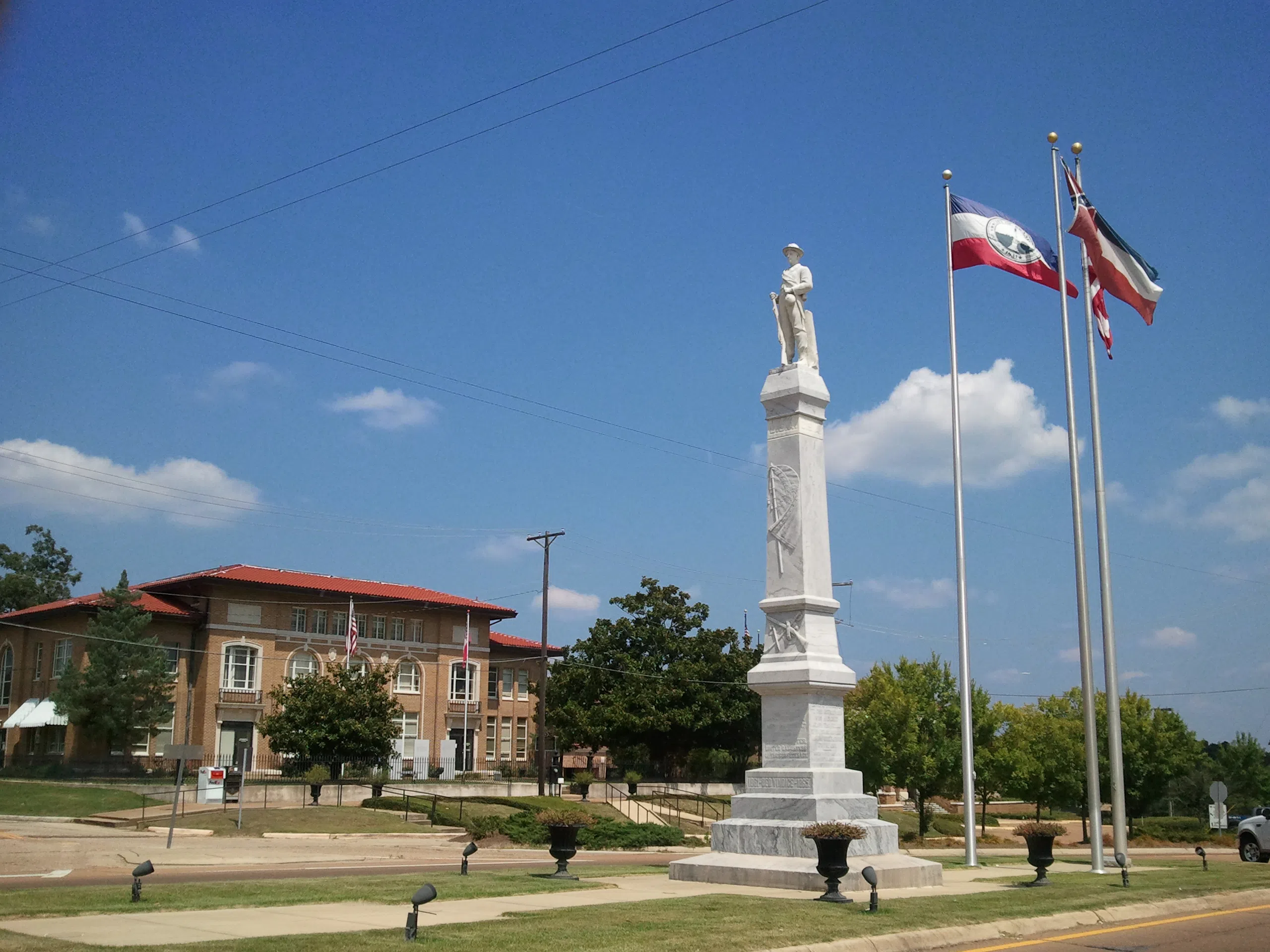 Rankin County Confederate Monument with historic courthouse