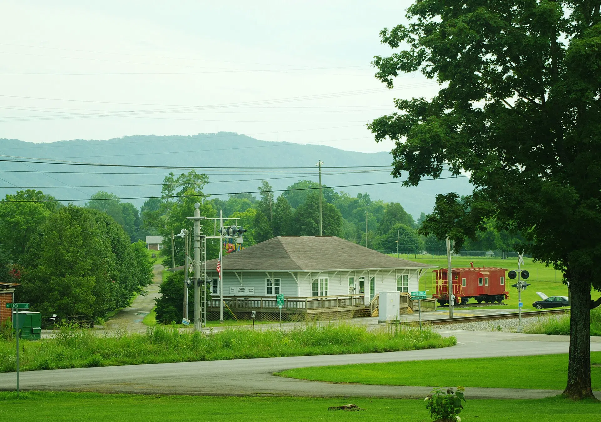 The Corryton Branch of the Knox County Public Library, built in the style of the old Corryton Depot, with House Mountain in the distance